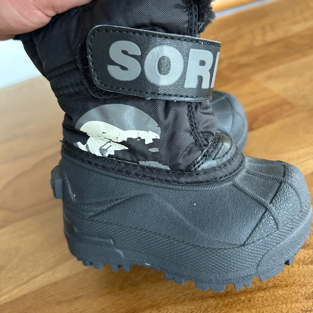 Sorel Kids Black Snow Boots with Velcro strap and Polar Bear Accent. Waterproof.